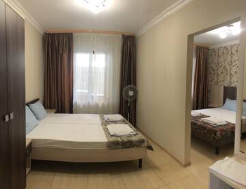 Фото номера Стандартный семейный номер Гостевой дом Mini Hotel Beliy Parus г. Вардане 4