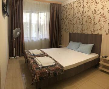 Фото номера Стандартный семейный номер Гостевой дом Mini Hotel Beliy Parus г. Вардане 2