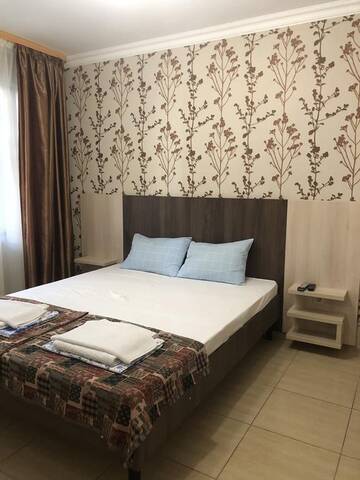 Фото номера Стандартный семейный номер Гостевой дом Mini Hotel Beliy Parus г. Вардане 6